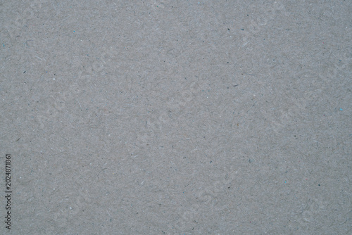 Gray recycled paper texture providing an eco friendly background surface