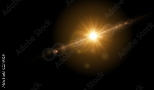 Bright golden sun flare effect with diagonal anamorphic light beam and bokeh isolated on black background
