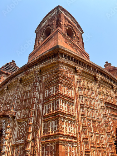 This Pancharatna temple, rich in terracotta work, is named the Shyamray or Pachmura Temple. This temple is richly endowed with terracotta ornamentation.