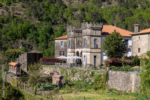 Photos Historic stone castle building with hórreo in portugal