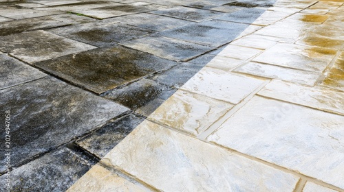 Before and After Professional Pressure Washing on Stone Patio Surface