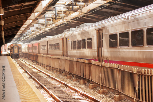 Two trains as part of American second busiest railroad system within the Hoboken Terminal in New Jersey, USA