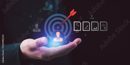 Konstfotografi HR recruiter targets qualified candidates recruitment analytics, workforce screening, talent acquisition strategy, employee evaluation, hiring optimization, digital profiling, performance tracking