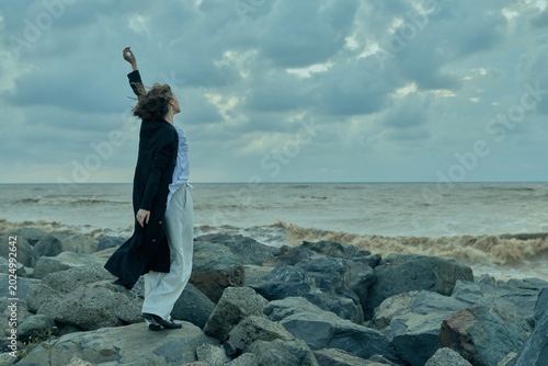 Vászonkép Sea, rocks, wind, couple, outdoors, shoreline, cloudy, movement describe two fig