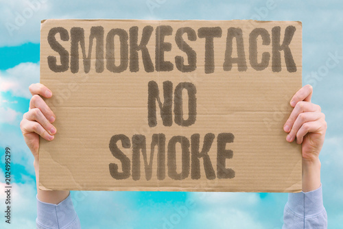 Schilderij op canvas "Smokestack No Smoke" The towering chimneys of dead factories haunt skylines like silent monuments