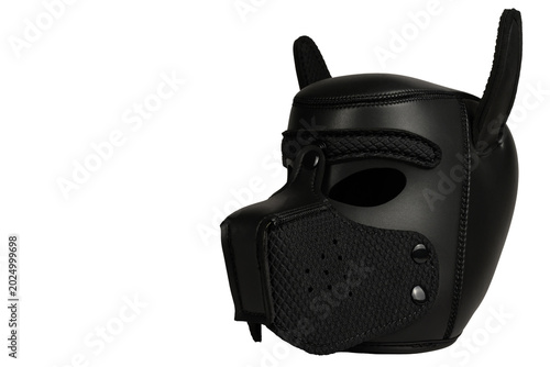 Black canine-inspired leather mask isolated on a white background, featuring textured details and pointed ears. Ideal for cosplay, alternative fashion, theatrical, bondage and costume concepts.