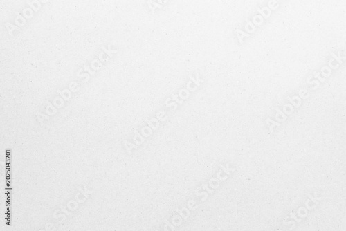 White recycled craft paper texture as background. Grey paper texture, Old vintage page or grunge vignette of old newspaper. Pattern rough art creased grunge letter. Hardboard with copy space for text.
