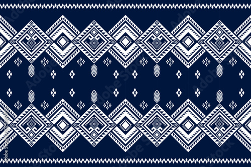 Seamless tribal vector pattern inspired by indigenous ethnic textiles, featuring blue and white geometric ornaments feather accents arrow motifs zigzag borders floral symbols and traditional woven