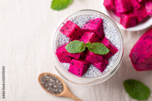Quadro su tela Chia pudding topped with fresh dragon fruit in a glass, Healthy eating