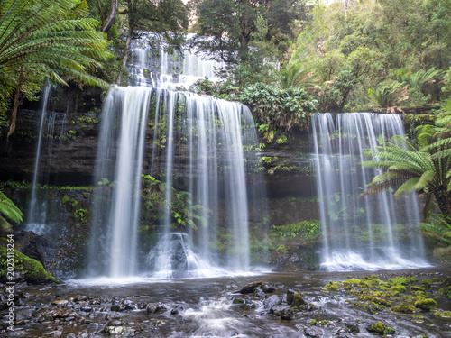 Russell Falls, a tiered–cascade waterfall in the Central Highlands region of Tasmania, Australia.