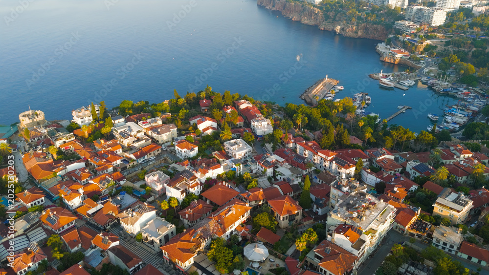 Obraz premium Antalya, Turkey. Aerial composition of historic Kaleici Old Town with Mediterranean Sea and yacht marina in morning sunlight.. Aerial View