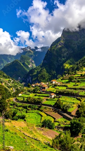 A serene mountain village surrounded by lush greenery and clouds