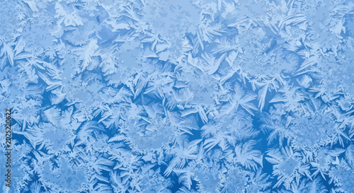 Konstfotografi Cold winter frost patterns on frozen window glass