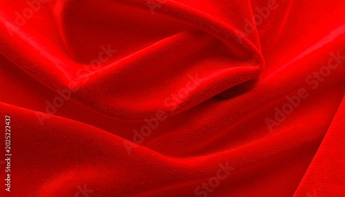 Foto Vibrant red velvet fabric with soft folds and creases luxurious texture and gent