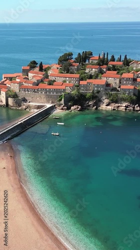 Scenic aerial view of sveti stefan, a small islet and 5-star hotel resort on the adriatic coast of montenegro, near budva