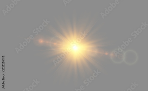 Φωτογραφία Bright golden starburst with optical bokeh light leak overlay