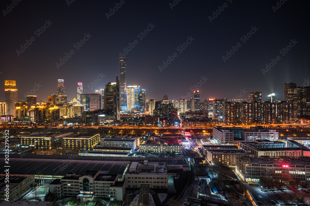 Fototapeta premium Aerial view of Beijing CBD from China: Winter night view of China Zun.