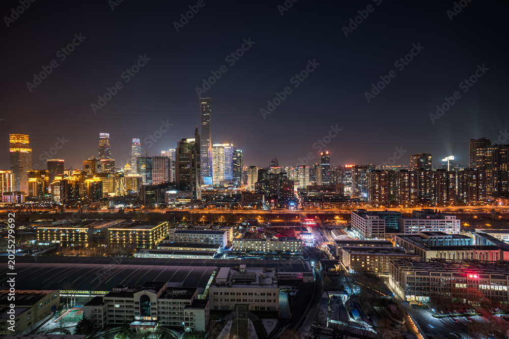 Fototapeta premium Aerial view of Beijing CBD from China: Winter night view of China Zun.