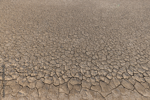 Photos Cracked dry ground texture background, Global warming and drought concept,High angle view of dry and cracked earth texture background, concept of global warming, climate change, and severe drought