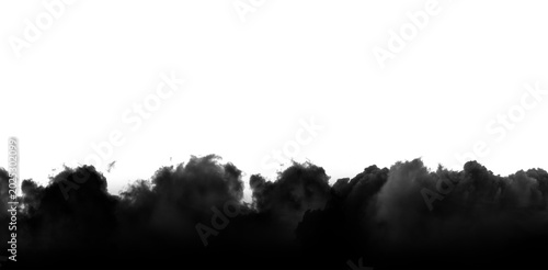 Foto Dense dark smoke billows upwards in a dramatic formation across the bottom of th