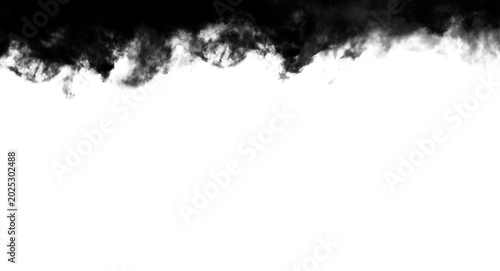 Foto Dark black smoke cloud rising in a thick plume across the top edge of this high contrast photographic image showing wispy vapor patterns drifting slowly against a bright stark backdrop