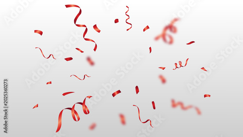 bursting red confetti and ribbon