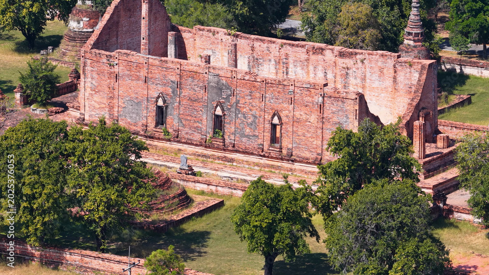 Fototapeta premium Aerial View of Ancient Red Brick Temple Ruins in Ayutthaya Thailand