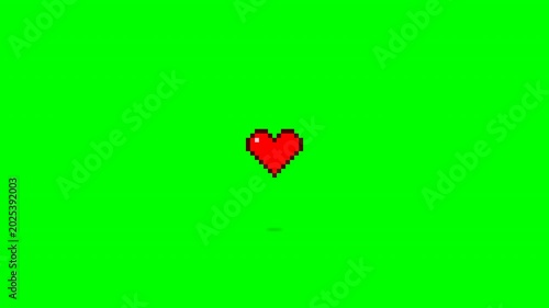 A pixelated red heart with black outline floats on a bright green background, representing classic digital art or gaming visuals