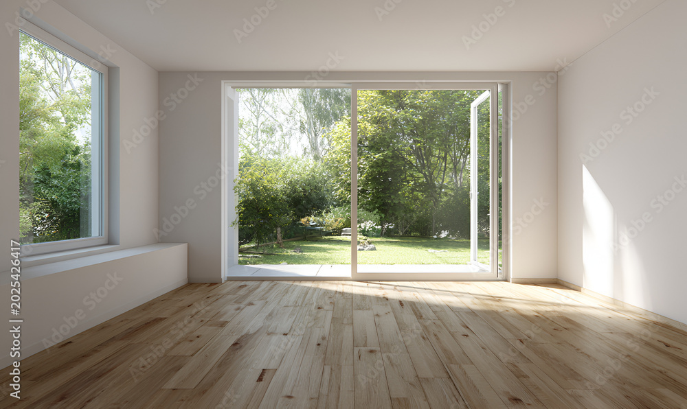 Fototapeta premium An empty room with hardwood floors and large windows overlooking a lush green backyard, bathed in sunlight
