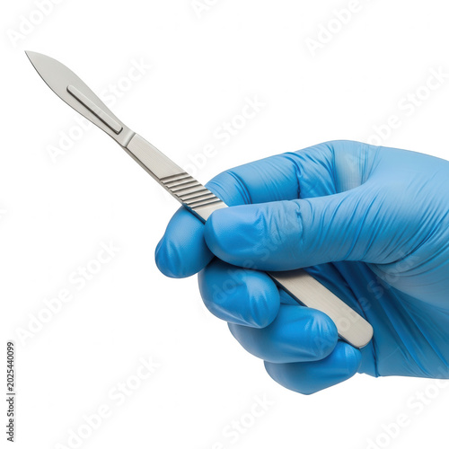 Gloved hand holding a blood collection tube