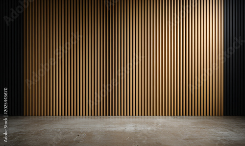 An empty room with vertical wooden slats on the back wall, framed by black panels, and a concrete floor
