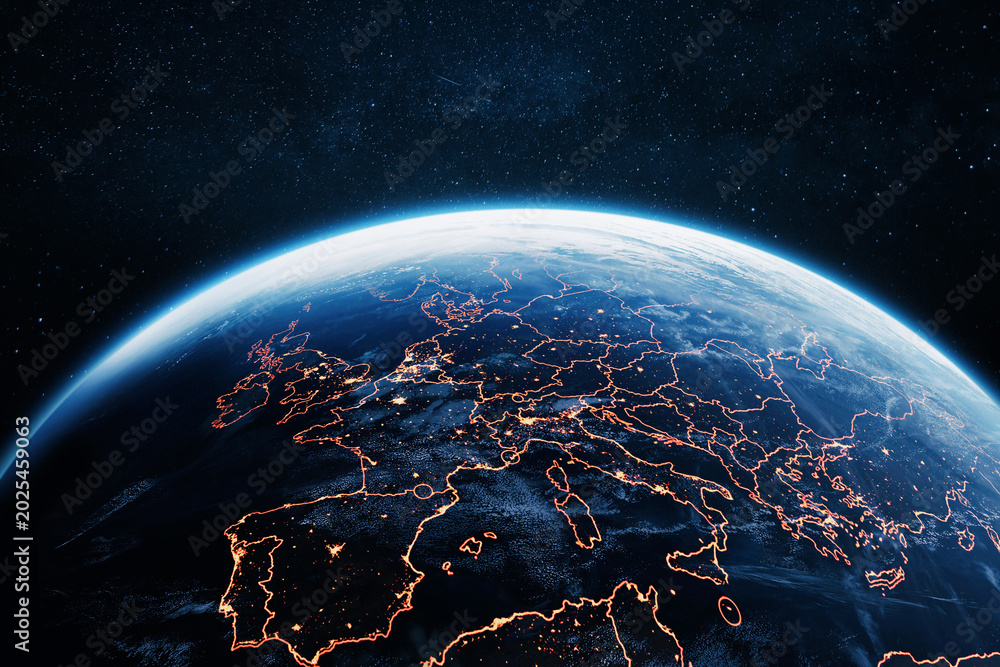 Obraz premium stunning satellite view of Europe at night from space, showing glowing city lights and golden country borders against the dark blue planet Earth, with a starry cosmos backdrop