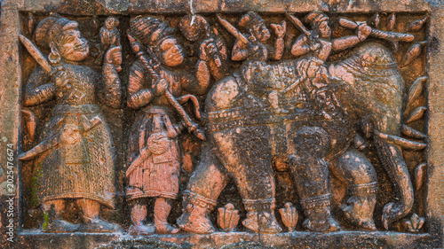 Fotografi Closeup view of terracotta hunting party with man and mahout on elephant at anci