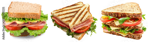 Foto Three different sandwiches with lettuce, tomato, ham, and cheese, isolated on a