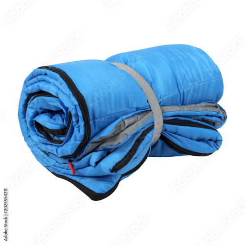 Rolled up blue sleeping bag isolated on transparent background