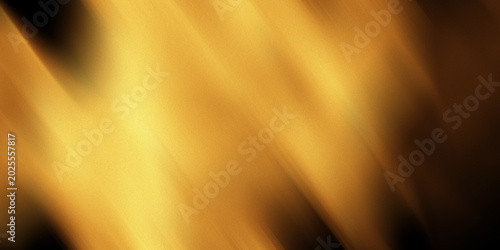 Golden abstract background with blurred diagonal light streaks
