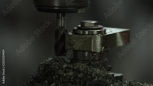 VDO 4K Lathe is working on turning metal parts for industrial use.	