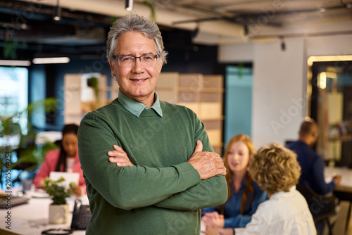 Successful senior businessman looking at camera with confidence