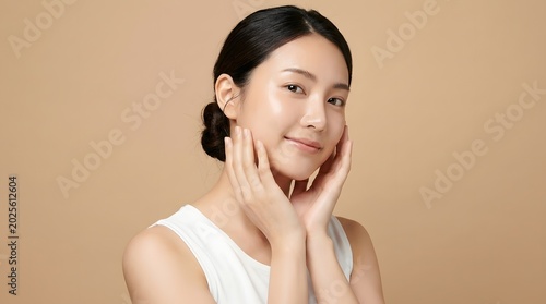 Clean skincare studio portrait of Japanese woman with fresh healthy skin