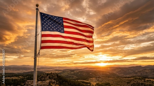 American flag waving at sunset over landscape