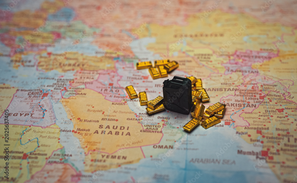 Naklejka premium Fuel canister with gold bars on Iran map resource wealth concept.
