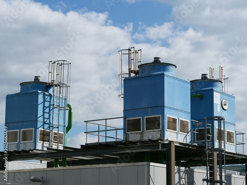 Photos Cooling towers are used for industrial cooling through evaporation
