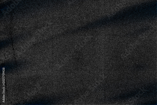 Photos Dark, granular texture with subtle blue and gray undertones suggesting depth and variation in its surface