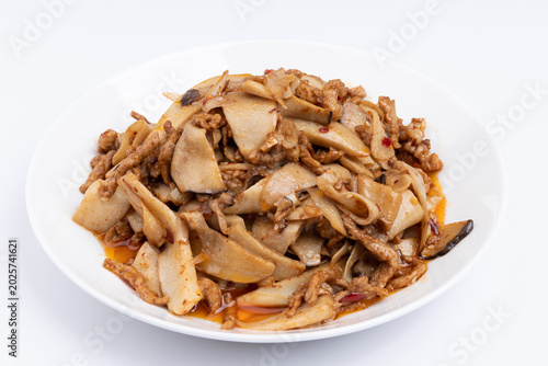 Stir-fried meat with shiitake mushrooms on the plate