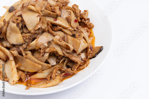 Stir-fried meat with shiitake mushrooms on the plate