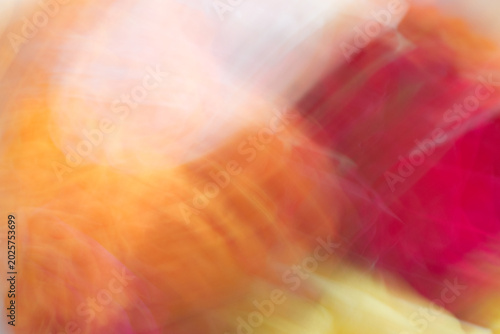 Vászonkép Abstract motion blur background with vibrant orange and red colors, intentional