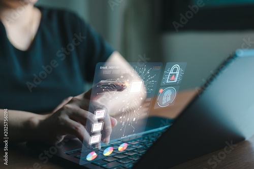 Bild auf Leinwand User interacting with advanced cybersecurity interface on laptop, featuring biometric authentication and secure digital identity protection