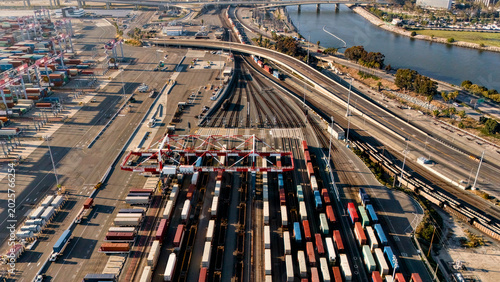 Drone view of freight rail yard containers and port infrastructure