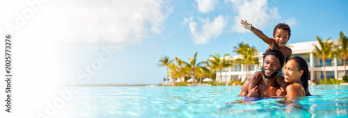 Afro-american family enjoying time together in outdoor swimming pool banner, tropical resort vacation setting, travel and leisure promotion, lifestyle and hospitality marketing, copy space