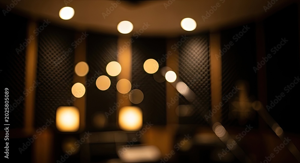 Fototapeta premium Abstract Bokeh Lights in a Dark Interior Setting.